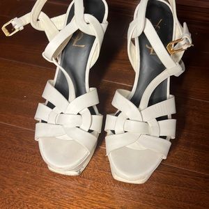 YSL white tribute sandal with scuffs